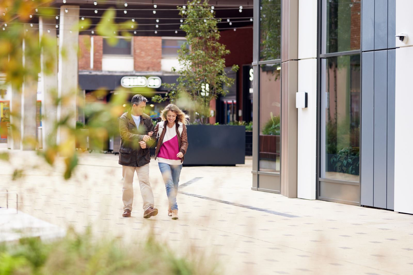 couple walking through Friar's walk